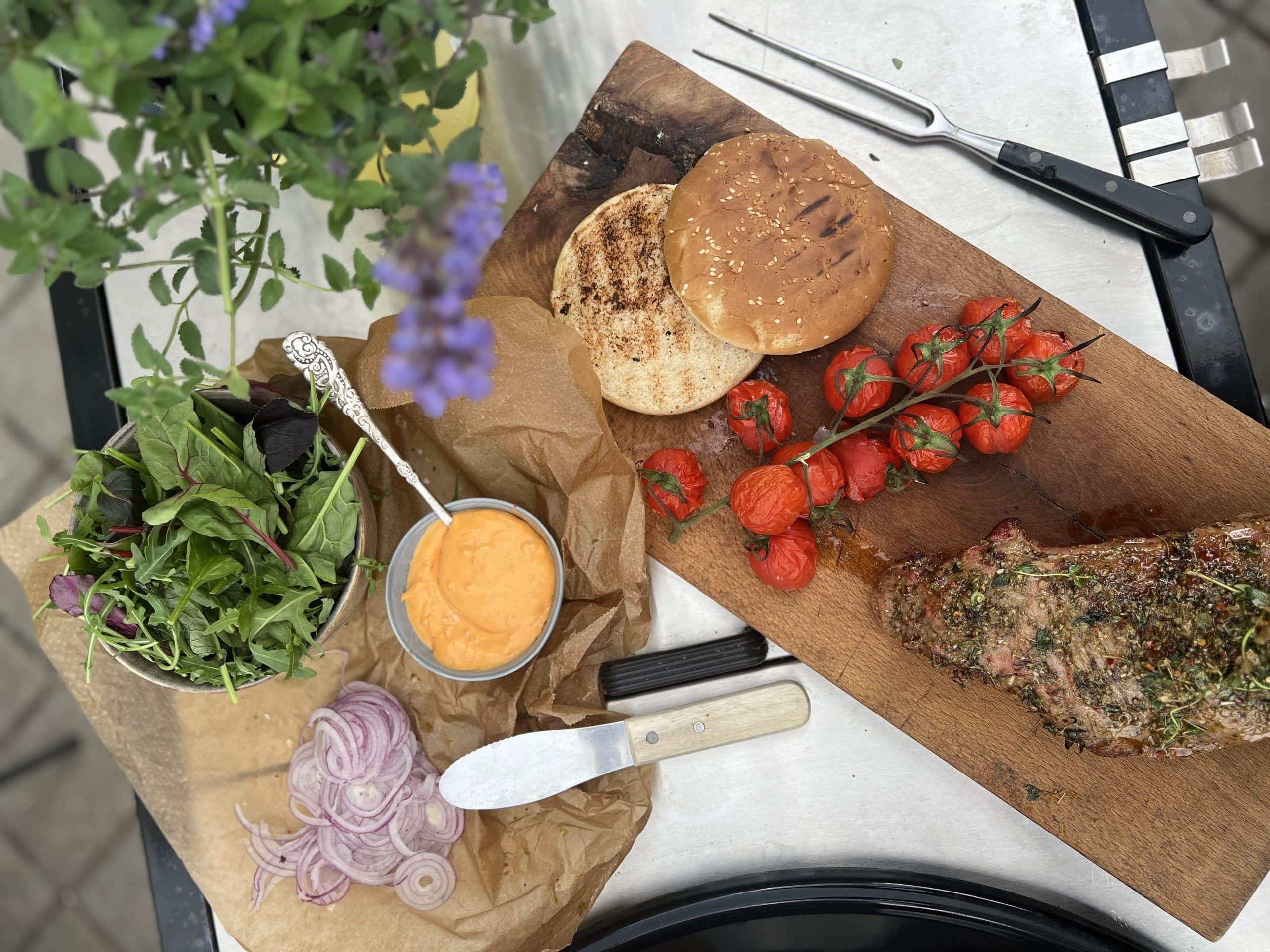 This Juicy Homemade Burger with Grilled Tomatoes and Roast Will Revolutionize Your BBQ