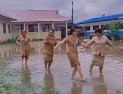 Video Guru Menari Viral di Sekolah Banjir; Akhirnya Dipecat dari Jabatan Video Guru Menari Viral di Sekolah Banjir; Akhirnya Dipecat dari Jabatan