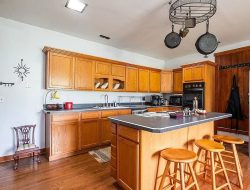 Golden Oak Kitchen: A Blast from the Past Surrounded by Mind-Blowing Modernity