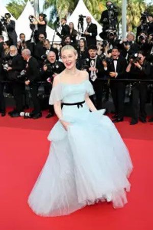 Elle Fanning Steals the Show with Stylish Exit at Cannes Festival