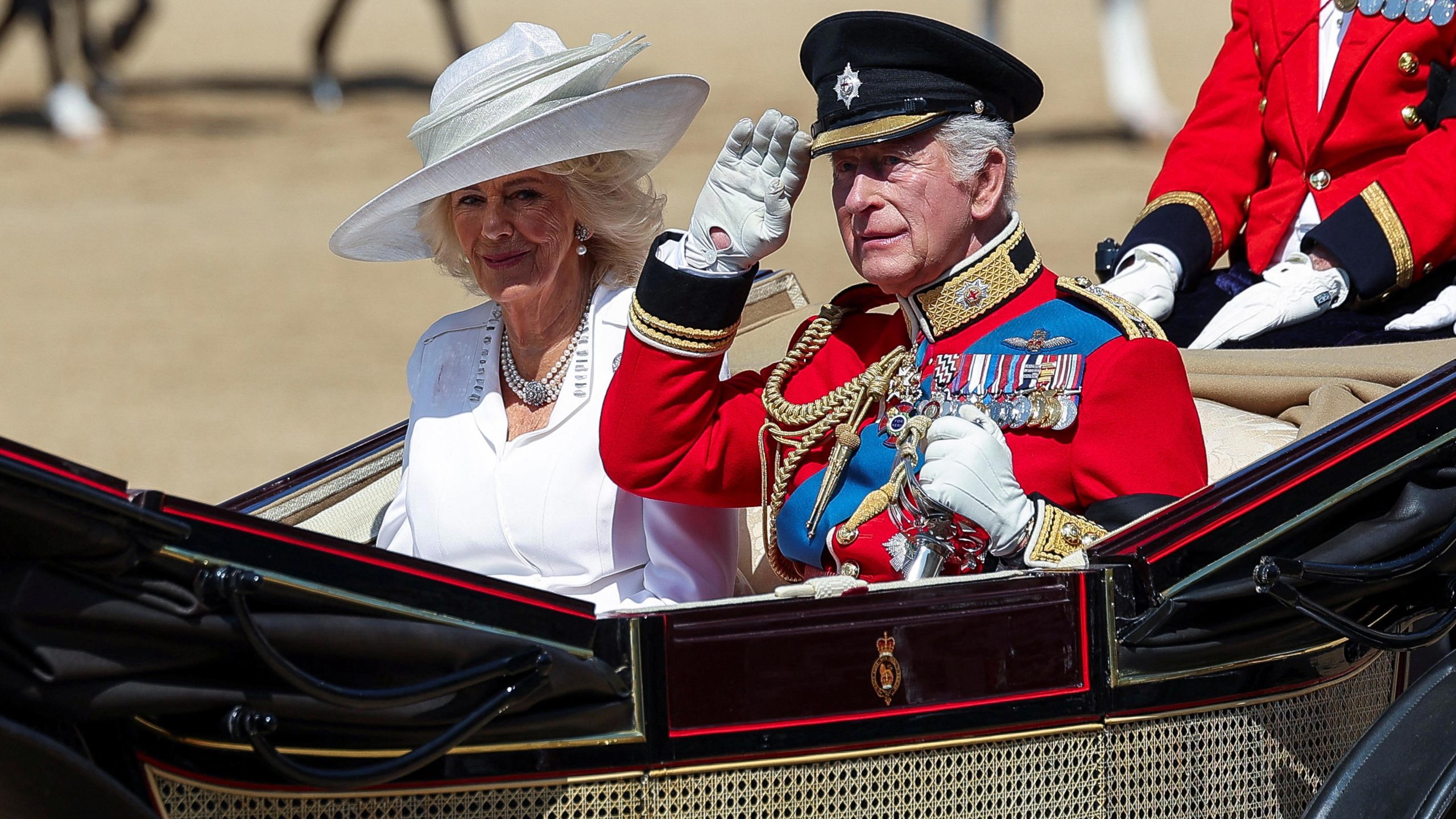 King and Queen cheered by thousands at Trooping the Colour
