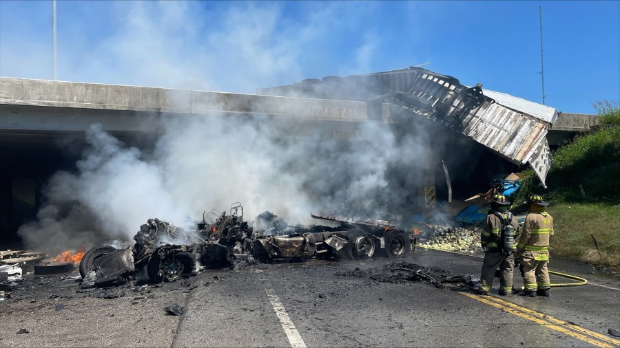 Semi-truck drives off Oklahoma overpass, explodes follwing crash; driver survives