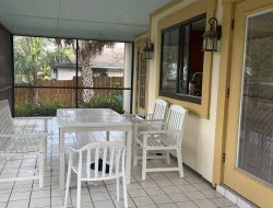Transformed: Dirty Screened-In Porch Now Resembles a Chic Bistro