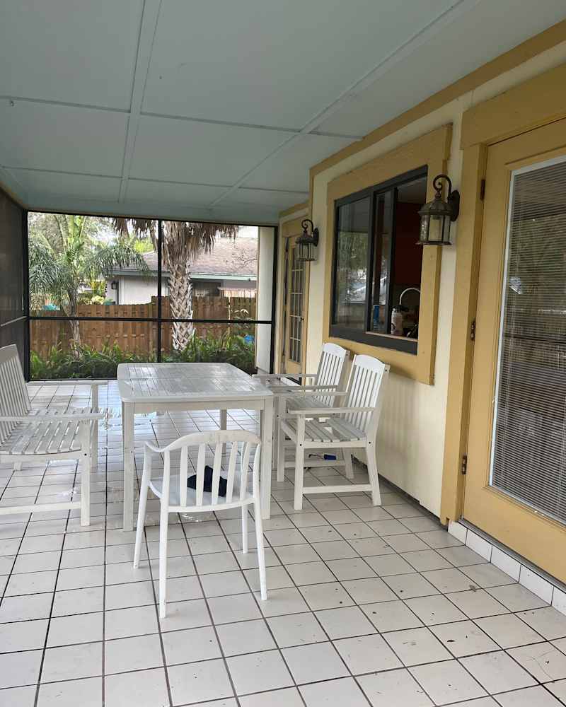 Transformed: Dirty Screened-In Porch Now Resembles a Chic Bistro