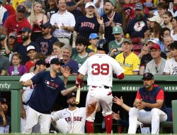 Red Sox Dominate Early, Cruise to 13-6 Victory Over Reds
