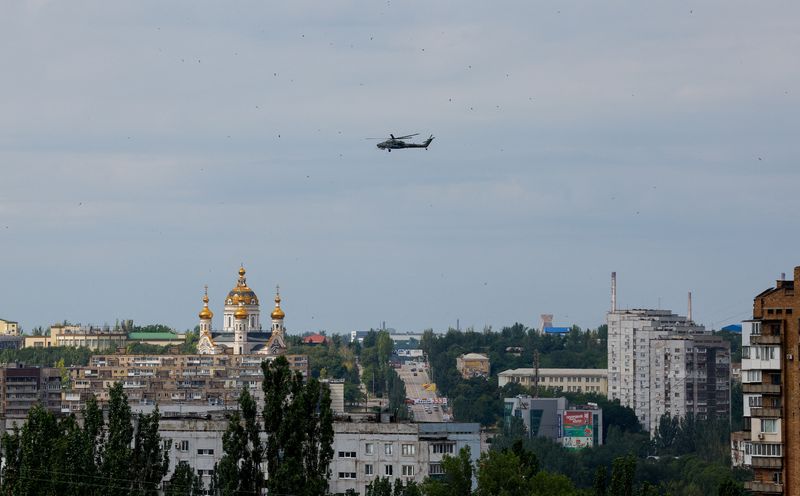 Shop Owner Vows to Rebuild After Third Destruction in Eastern Ukraine