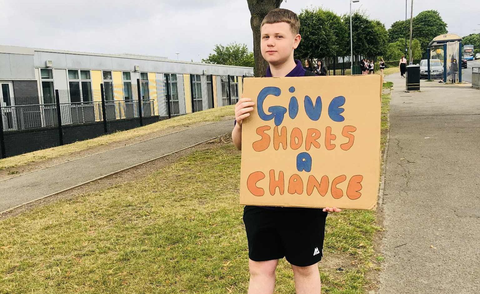 Students march for shorts during heatwave