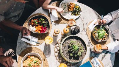 Woman Frustrated When Friends Order Her Meal Before She Arrives — Then Demand to Split the Bill