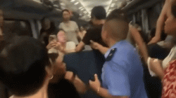 Passenger Shatters Train Window Amid Scorching Heat in China
