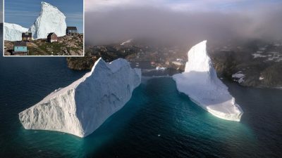 Stunning images reveal massive ice blocks drifting toward Greenland homes