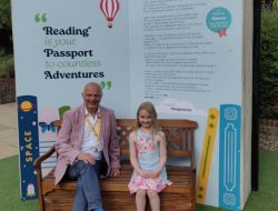 Community garden at shopping center opens with book-themed twist