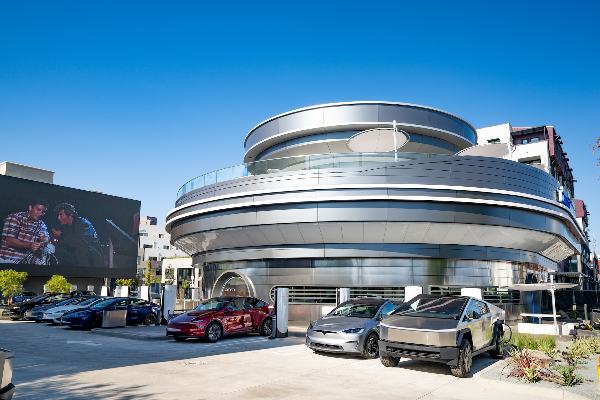Tesla’s retro-futuristic diner opens as Elon Musk teases more locations