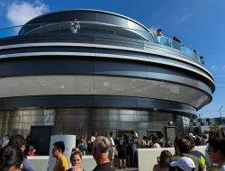 Elon Musk Fans Crowd Tesla Diner Opening: See the Photos