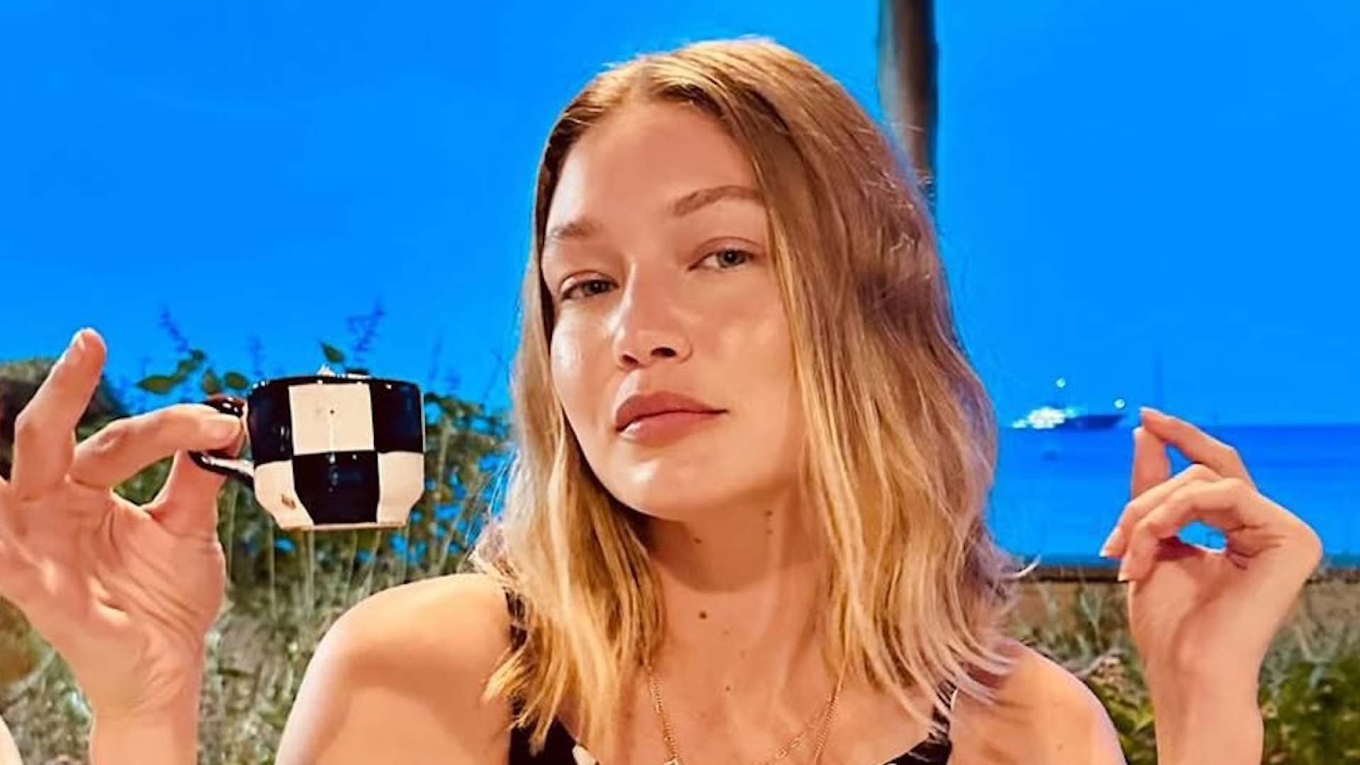 Gigi Hadid’s Black-and-White Polka-Dot Dress Matches Her Teacup