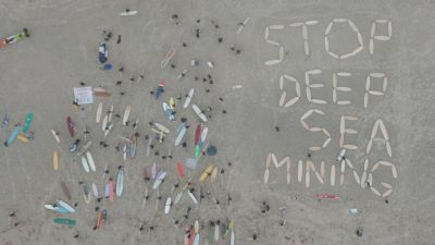 Surfers protest as delegates weigh deep-sea mining decision