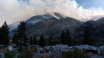 Wildfire Devours Mountain Near Western Canadian City