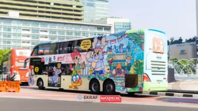 Peringati HUT RI Ke-80, MaxDecal Hiasi Transjakarta Jadi Meriah