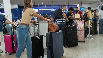 Travel turmoil as top airports shut down amid major flight delays