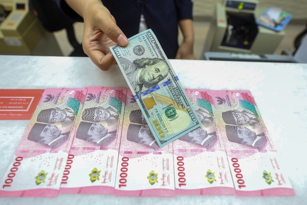 Asing Tarik Dana dari SBN, SRBI, dan Saham Usai BI Rate Turun
